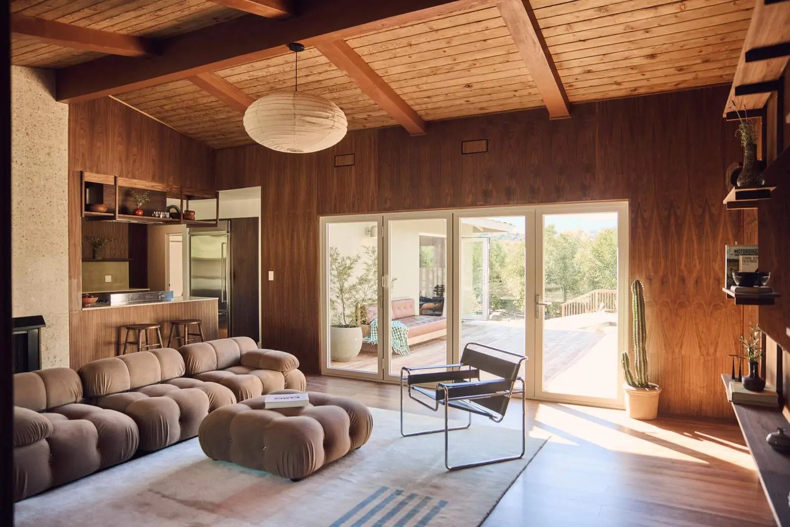 Living room opening to the deck through glass doors, Ojai East End