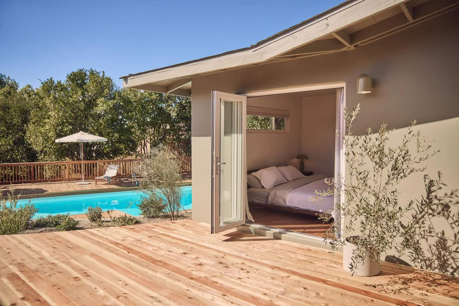 Bedroom doors opening onto the pool deck, Ojai East End