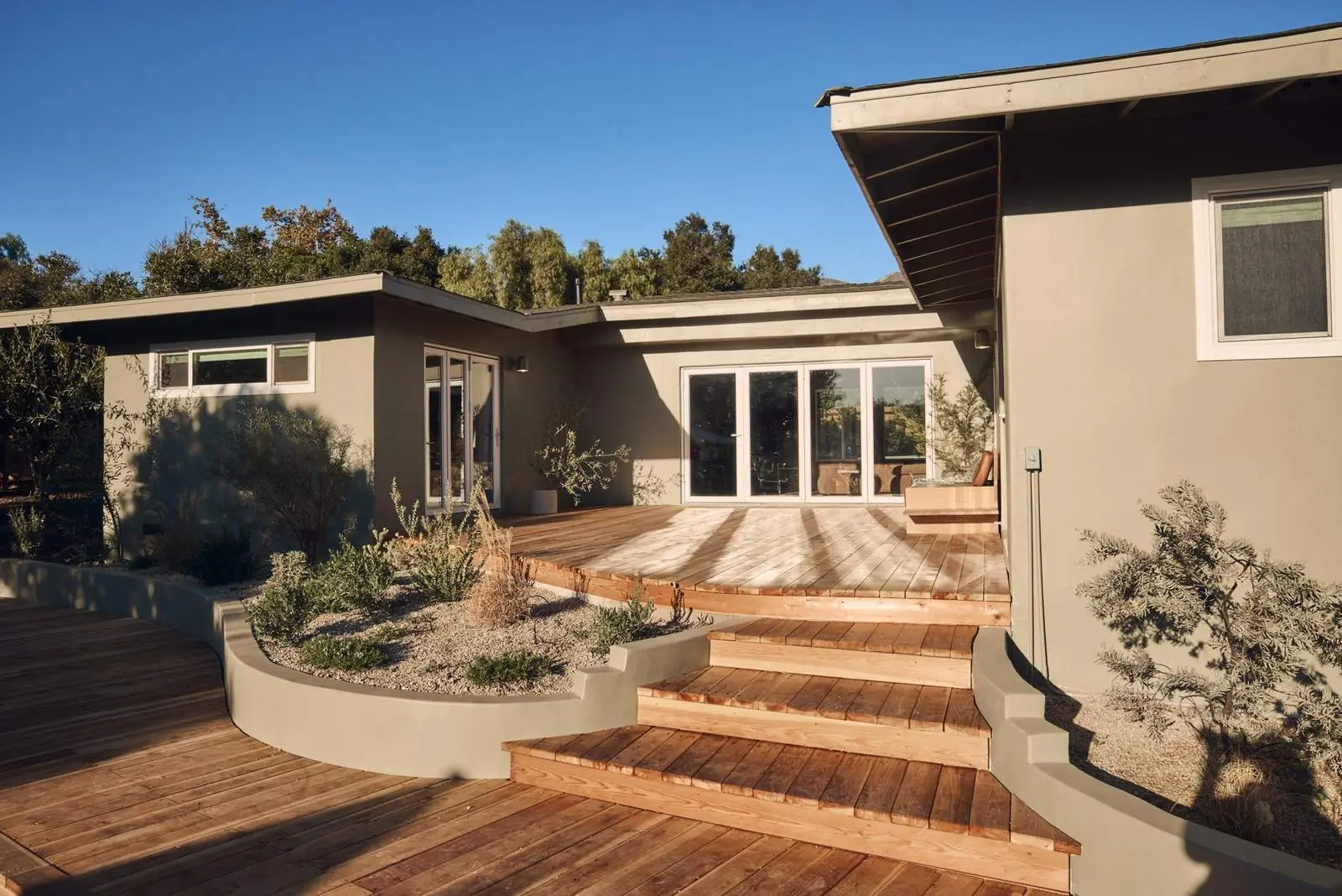 Wood deck stepping down from the house to the pool, Ojai East End