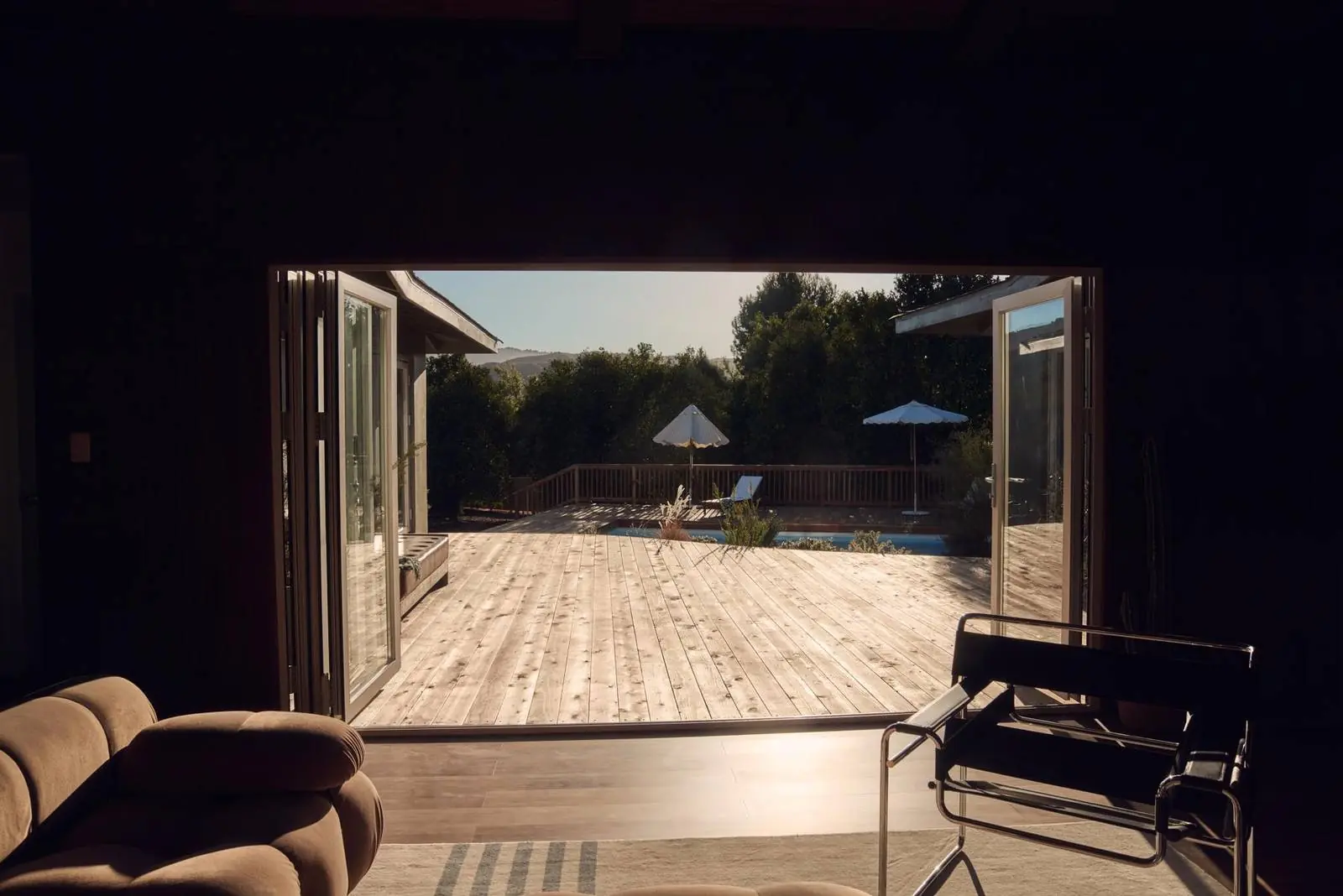 Folding doors opening onto the pool deck, Ojai East End