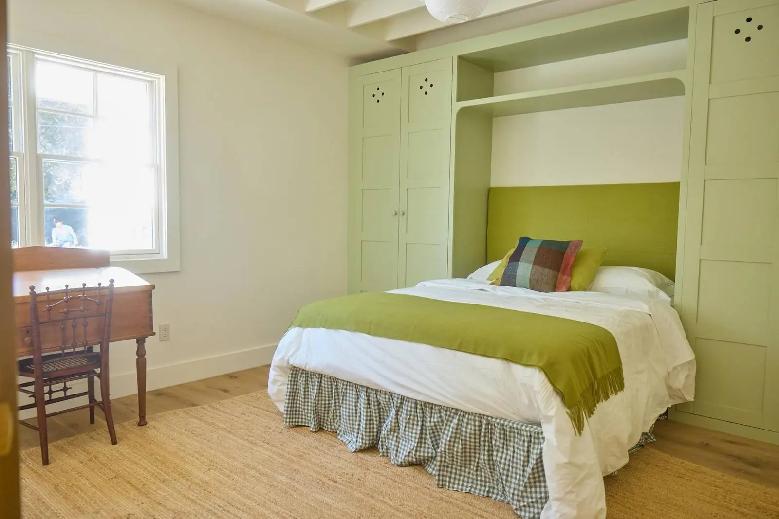 Bedroom with green built-in cabinets, Ojai Gridley