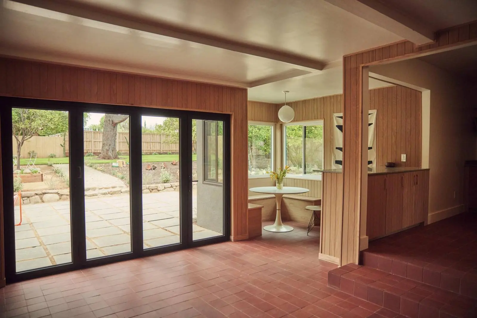 Family room with glass doors opening to the patio, Ojai Woodland